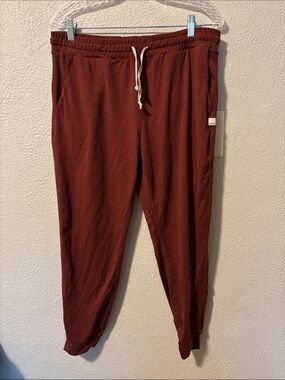 Vuori sweatpants in a brick red